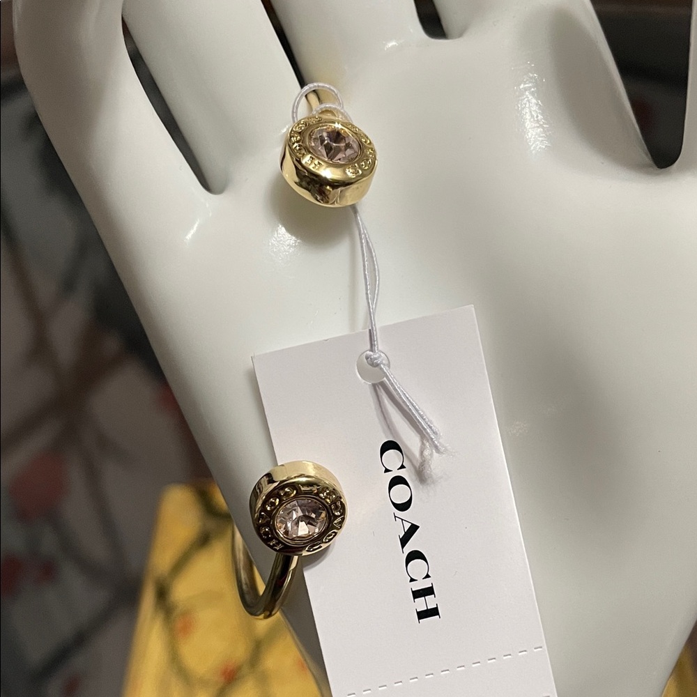 Coach Gold-Tone Open Cuff Bracelet with Crystal Ends